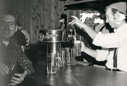 Pouring beer in German dress