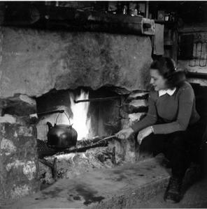 Nina at shack fireplace