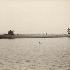 Whaleback barge underway