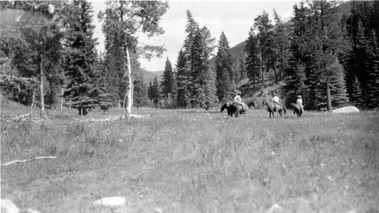 Horseback riders on prairie