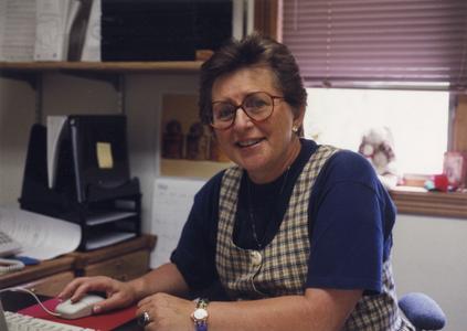 Outreach and Continuing Education Coordinator Joan Laabs at her desk
