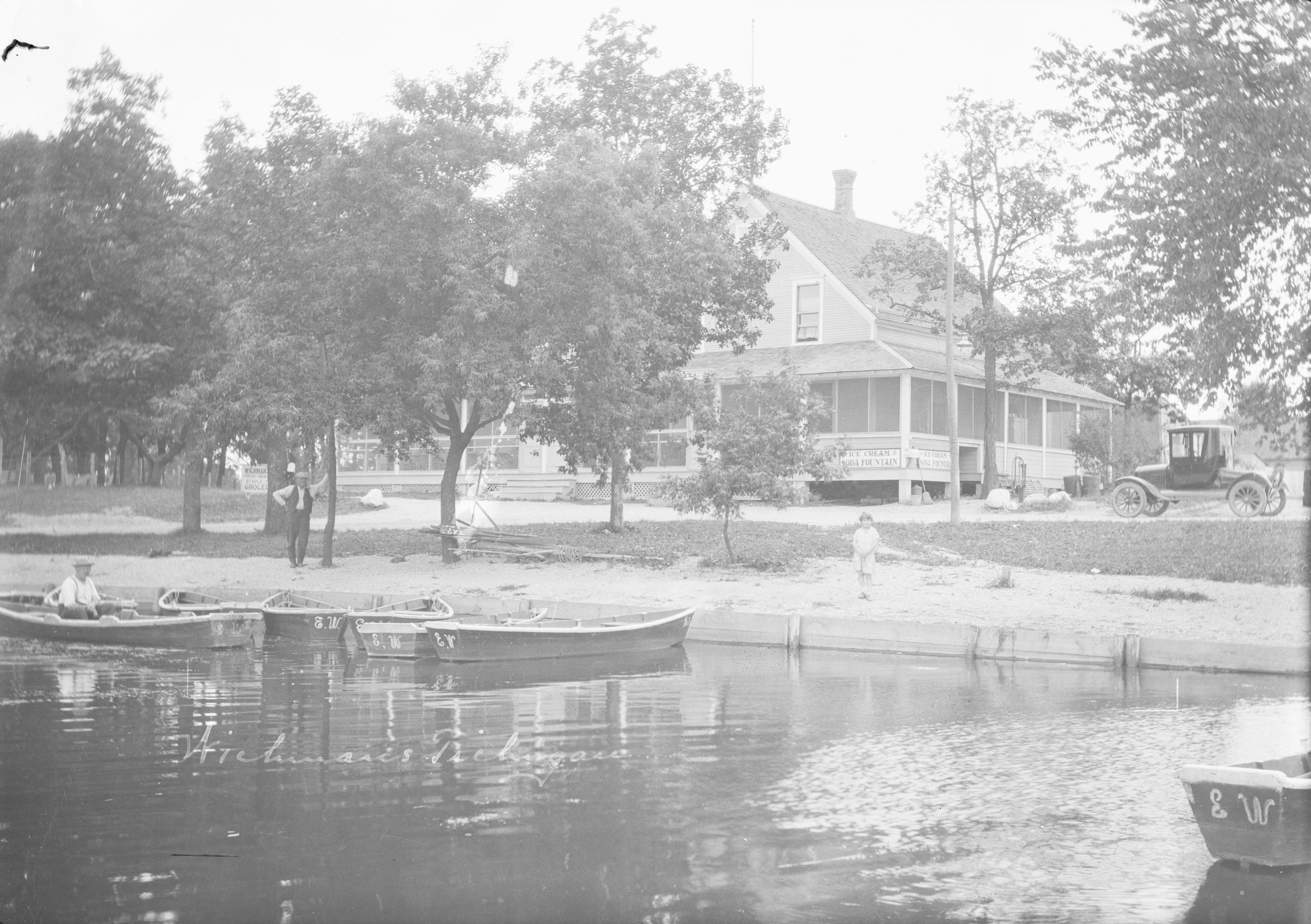 Group in front of Island Resort Hotel on Lyndon Dale Island in lake Fox  Lake (1 of 3) - UWDC - UW-Madison Libraries