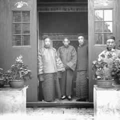 Four prominent citizens of Yeungkong 陽江. Notice the expensive flowers.