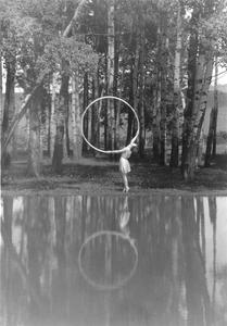 Woman dancing with hoop