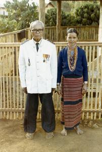 Former District Chief Mr. Noun with his wife in Attapu Province
