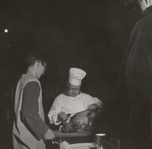 Chef cutting turkey