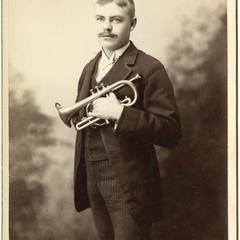 Man holding a cornet
