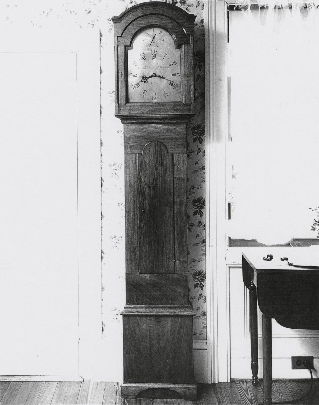 Black and white photograph of a eight-day, strike, and repeater clock.