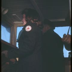 Annie in the boat cabin with the British captain