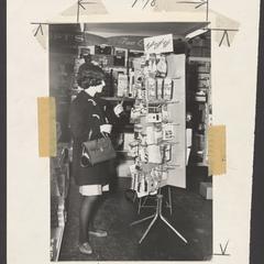 A woman shops for sewing supplies at a drugstore