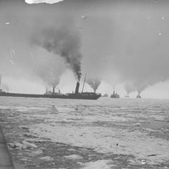 Vessels in ice at entrance to Duluth Ship Canal