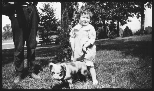 M. E. Reid & dog & T. E. B. Jr.