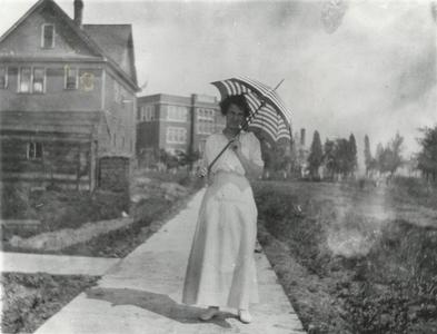 Woman with parasol near Old Main