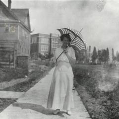 Woman with parasol near Old Main