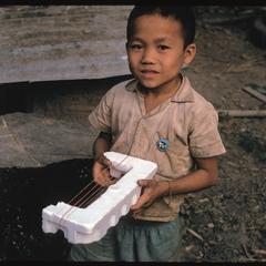Child with plastic crating