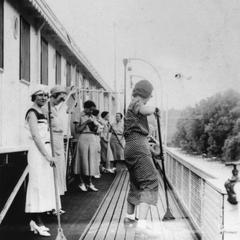 Women playing shuffleboard on deck of the Gordon C. Greene