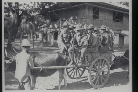 Part of a rifle company loaded on a native bull cart, 1931
