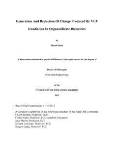 Generation And Reduction Of Charge Produced By VUV Irradiation In Organosilicate Dielectrics