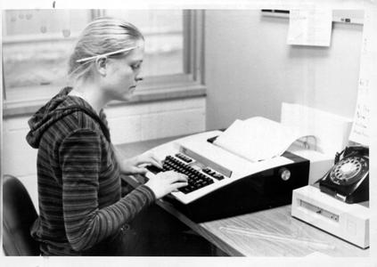 Student using typewriter