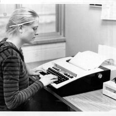 Student using typewriter