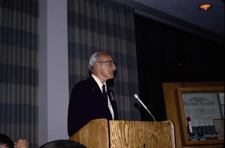 Dedication ceremony with Arthur D. Hasler at podium