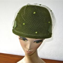 Dark green lampshade-style hat