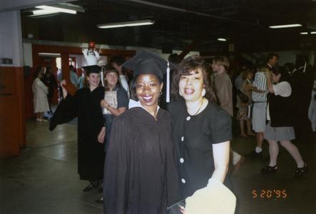 African American student and friend at 1995 graduation
