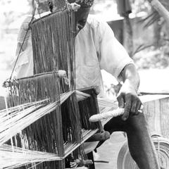 Man Weaving Cotton on Strip Loom