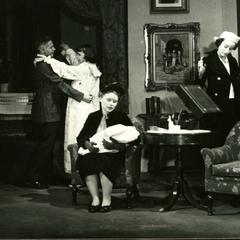 Alpha Psi Omega - Performing a play onstage, living room scene