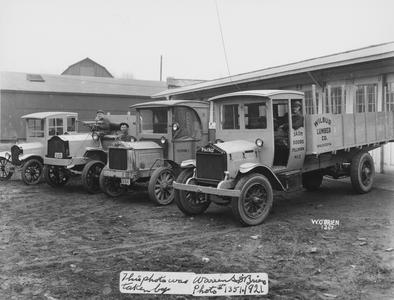 Wilbur Lumber Company, Waukesha, trucks with drivers