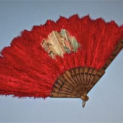 Large red feather fan with painted scene