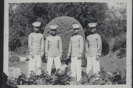 Four cadets in Mansion House gardens, Baguio