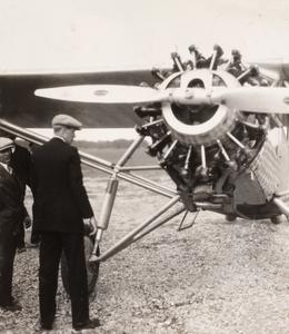 Lindbergh and unidentified man with plane.