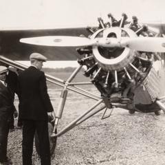 Lindbergh and unidentified man with plane.