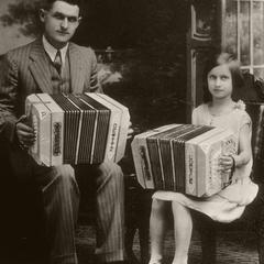 Irving DeWitz and daughter Lucile pose with concertinas