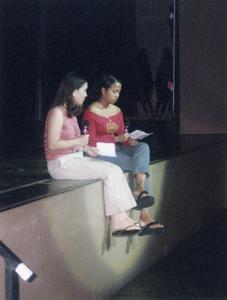 Two students perform during the poetry slam at 2003 MCOR