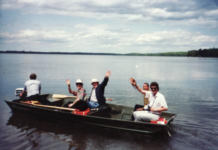 Group of UW officials on Trout Lake