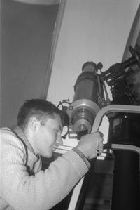 Student using telescope in Barstow observatory