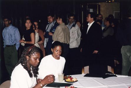 Students eating at 2000 Multicultural Graduation Reception