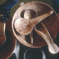 Carved wooden spoons and bowls by Myron Lowe