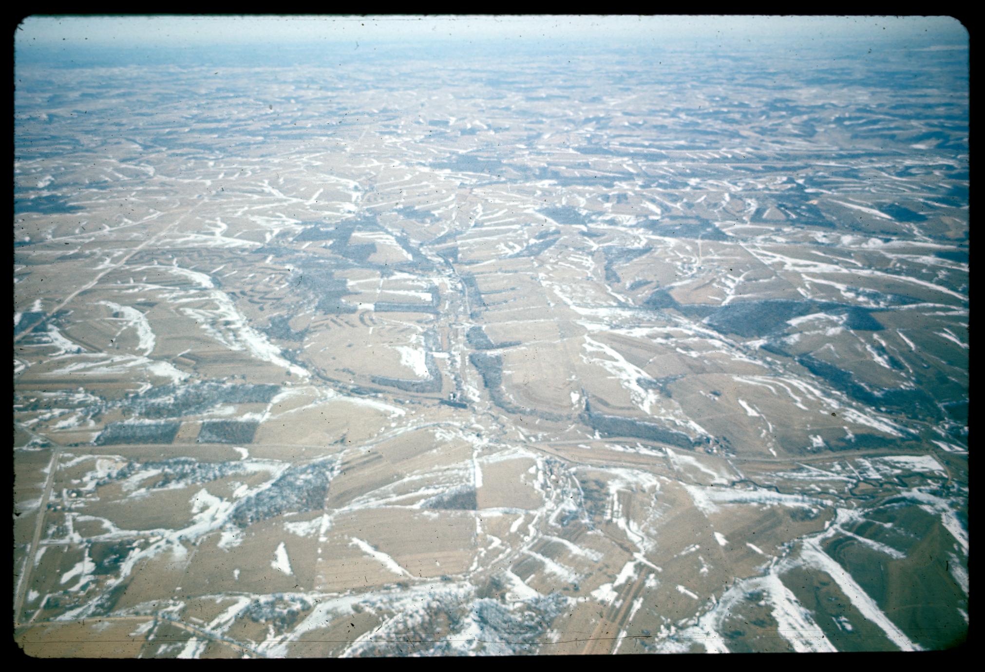 Aerial winter view of dendritic erosion in an agricultural landscape; probably in the driftless area of southwestern Wisconsin