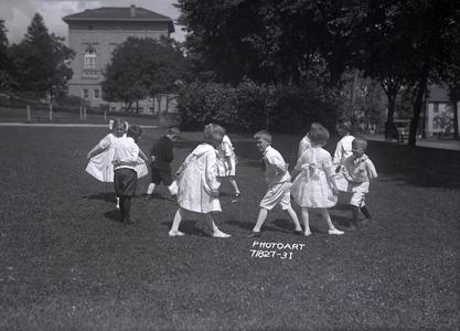 Children playing near Agriculture Hall