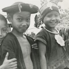 Akha boys and girl in the village of Phate, Houa Khong Province