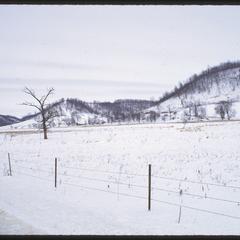 View of sandstone hills in winter from County Road E