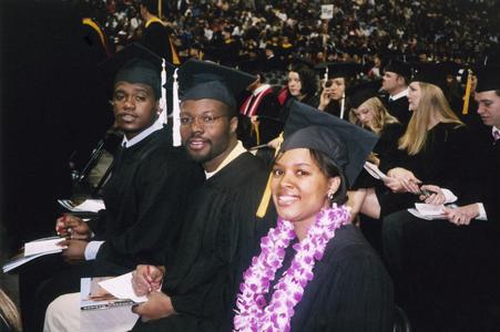 Three students at graduation in 2004