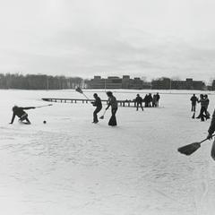 Students playing broom ball on Lake Wyllie