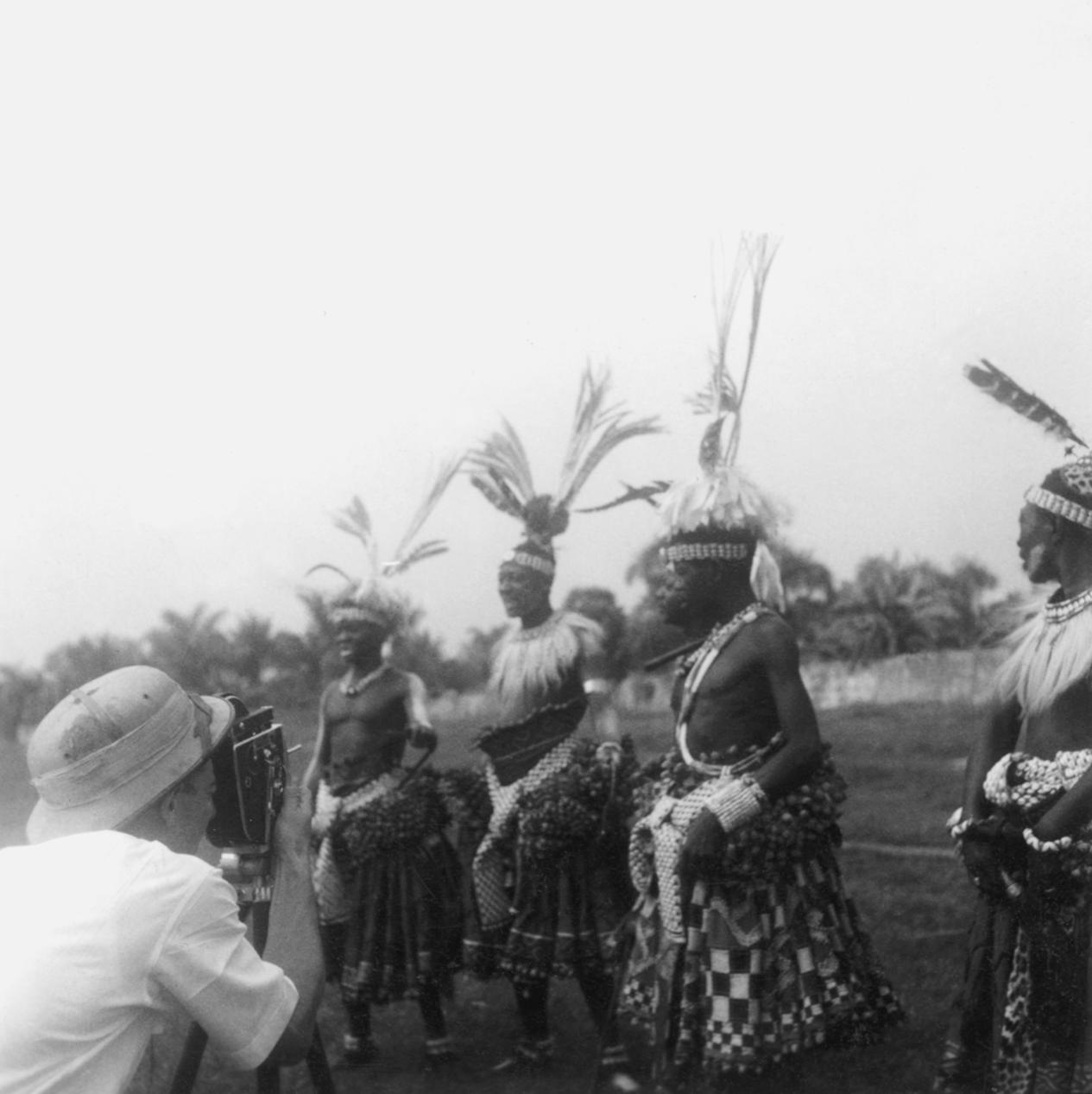 Local Adminstrator Photographing Kuba-Bushong Dance Preparations