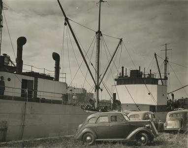Nash LaFayettes are loaded onto a ship in the Kenosha harbor