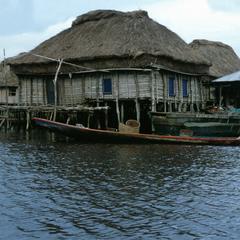 Boat Beside House in the Lake Village of Ganvié
