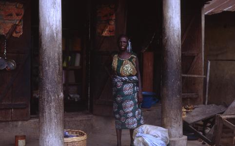 Woman in front of shop